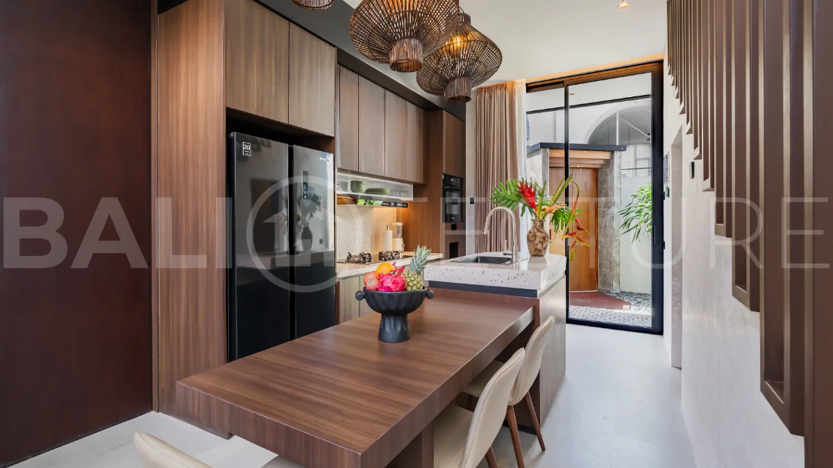 Modern 2-bedroom villa for sale near Pererenan Beach, Canggu, featuring stylish interiors, spacious living areas, tropical greenery, and a private swimming pool.