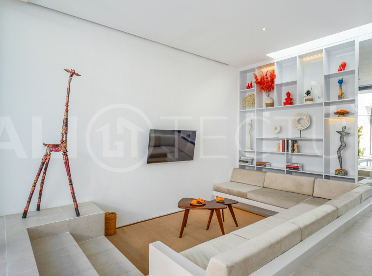 Brand new 2-bedroom villa with private pool for sale near Mertasari Beach, Sanur, featuring a fully furnished interior, 3 bathrooms, enclosed living area, and contemporary tropical design.