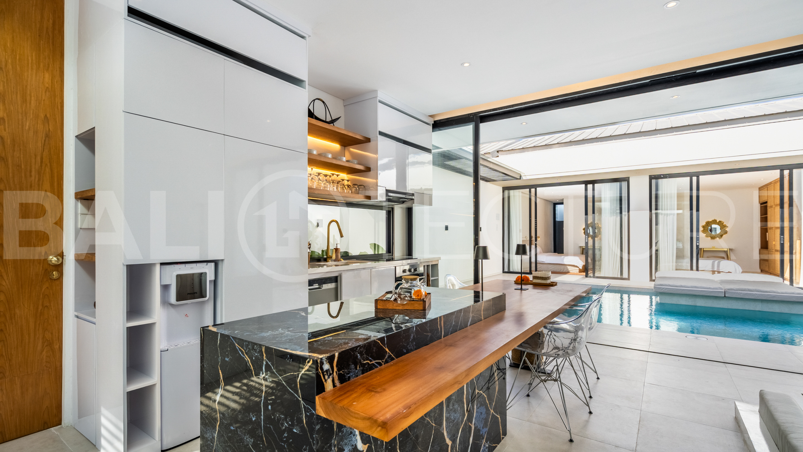 Brand new 2-bedroom villa with private pool for sale near Mertasari Beach, Sanur, featuring a fully furnished interior, 3 bathrooms, enclosed living area, and contemporary tropical design.