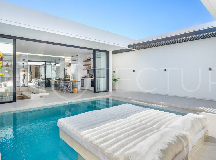 Brand new 2-bedroom villa with private pool for sale near Mertasari Beach, Sanur, featuring a fully furnished interior, 3 bathrooms, enclosed living area, and contemporary tropical design.