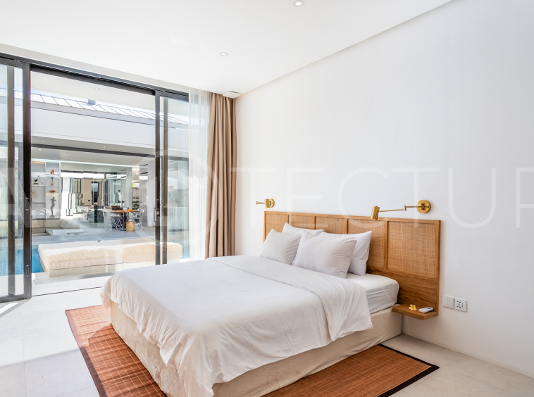 Brand new 2-bedroom villa with private pool for sale near Mertasari Beach, Sanur, featuring a fully furnished interior, 3 bathrooms, enclosed living area, and contemporary tropical design.