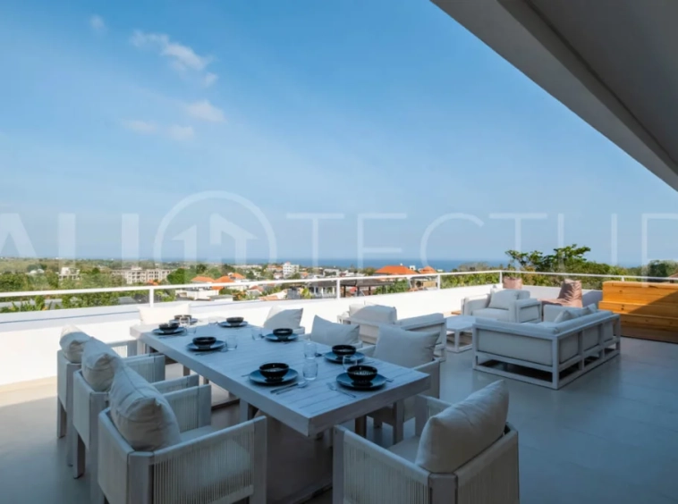 Luxury 3 Bedroom Ocean View Villa for Sale in Ungasan featuring contemporary interiors, a spacious open plan living and dining area, fully equipped designer kitchen with island, three ensuite bedrooms with walk in wardrobes and private balconies, a private swimming pool, panoramic sea views, a 126 sqm rooftop with outdoor kitchenette and entertaining area, plus a private sauna and ice bath. Set on 225 sqm of land with a 477 sqm building area, offered with a 28 year leasehold and guaranteed 30 year extension.