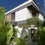 Three bedroom luxury off plan villa near Melasti Beach, Ungasan, featuring Japandi architecture, double height living room, ensuite bedrooms, mezzanine, private swimming pool, ocean view rooftop terrace, tropical landscaping, and seamless indoor outdoor living.