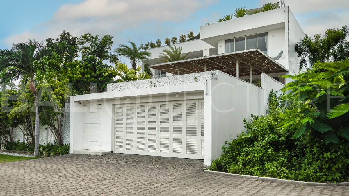 Luxury 4-bedroom turnkey villa for sale in Ungasan, Bali, featuring a private pool, elegant tropical interiors, home cinema, and a 360° panoramic rooftop with ocean, GWK, and Mount Agung views.