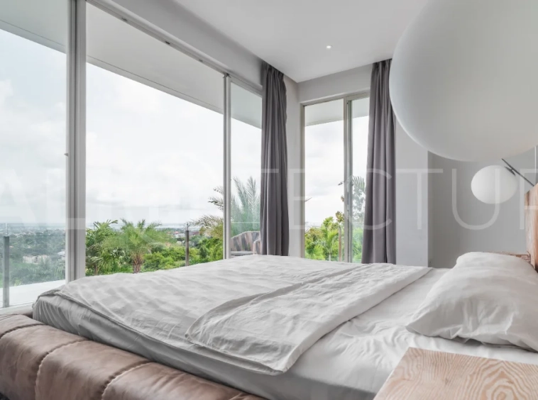Luxury 4-bedroom turnkey villa for sale in Ungasan, Bali, featuring a private pool, elegant tropical interiors, home cinema, and a 360° panoramic rooftop with ocean, GWK, and Mount Agung views.