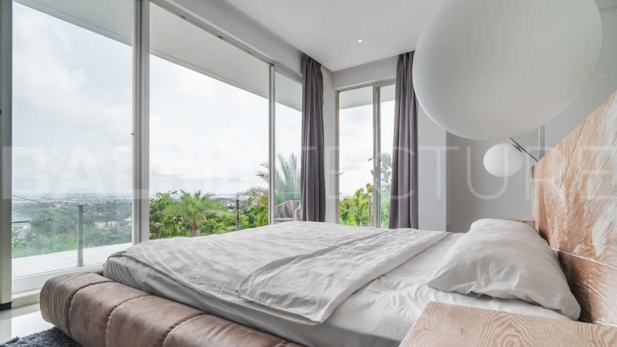 Luxury 4-bedroom turnkey villa for sale in Ungasan, Bali, featuring a private pool, elegant tropical interiors, home cinema, and a 360° panoramic rooftop with ocean, GWK, and Mount Agung views.