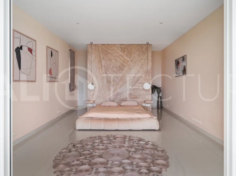 Luxury 4-bedroom turnkey villa for sale in Ungasan, Bali, featuring a private pool, elegant tropical interiors, home cinema, and a 360° panoramic rooftop with ocean, GWK, and Mount Agung views.