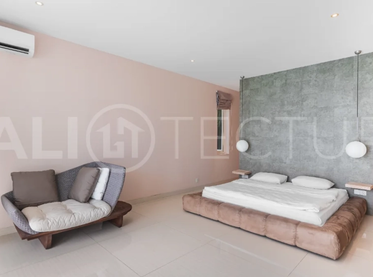 Luxury 4-bedroom turnkey villa for sale in Ungasan, Bali, featuring a private pool, elegant tropical interiors, home cinema, and a 360° panoramic rooftop with ocean, GWK, and Mount Agung views.