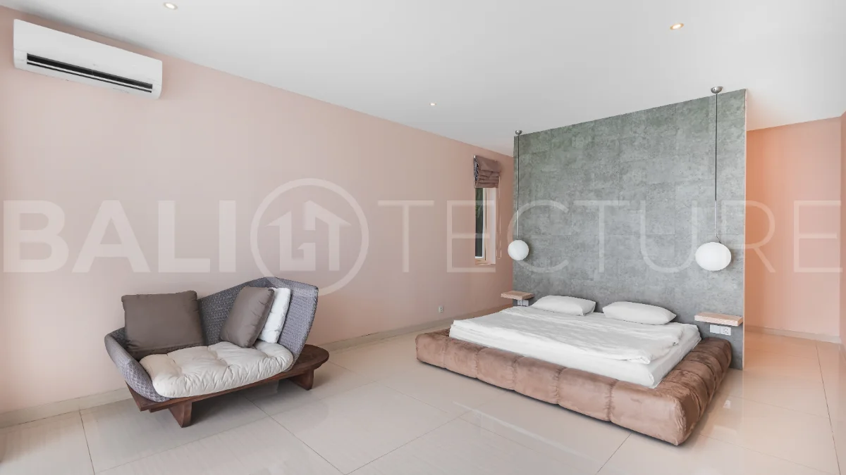 Luxury 4-bedroom turnkey villa for sale in Ungasan, Bali, featuring a private pool, elegant tropical interiors, home cinema, and a 360° panoramic rooftop with ocean, GWK, and Mount Agung views.