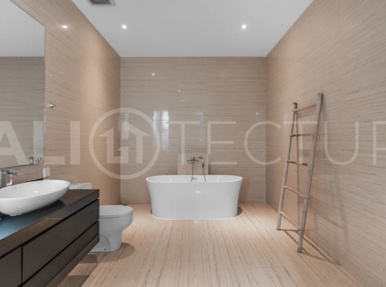 Luxury 4-bedroom turnkey villa for sale in Ungasan, Bali, featuring a private pool, elegant tropical interiors, home cinema, and a 360° panoramic rooftop with ocean, GWK, and Mount Agung views.