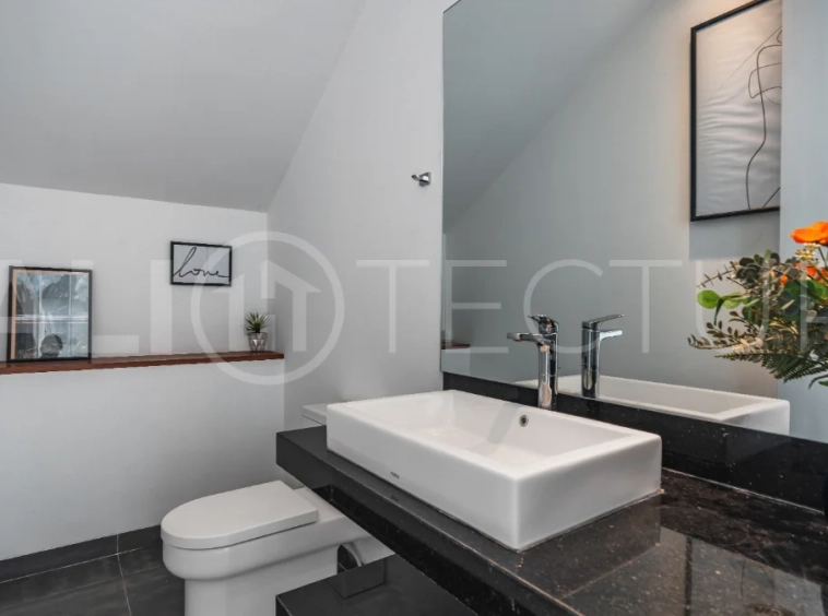 Luxury 4-bedroom turnkey villa for sale in Ungasan, Bali, featuring a private pool, elegant tropical interiors, home cinema, and a 360° panoramic rooftop with ocean, GWK, and Mount Agung views.