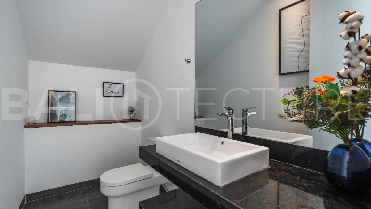 Luxury 4-bedroom turnkey villa for sale in Ungasan, Bali, featuring a private pool, elegant tropical interiors, home cinema, and a 360° panoramic rooftop with ocean, GWK, and Mount Agung views.