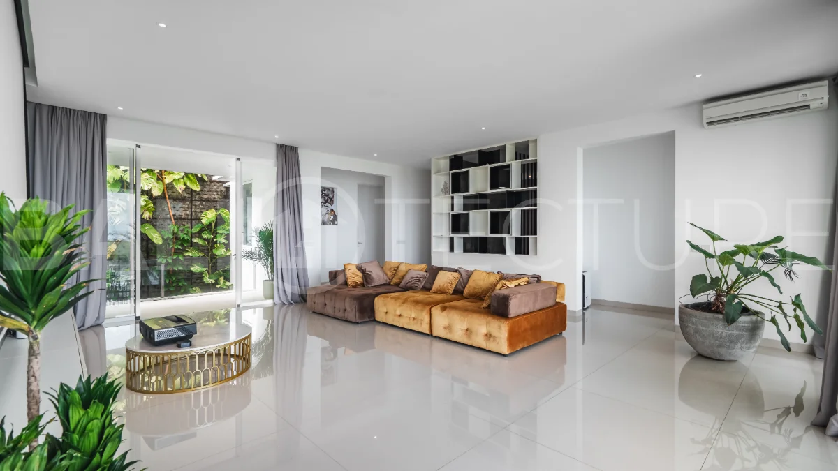 Luxury 4-bedroom turnkey villa for sale in Ungasan, Bali, featuring a private pool, elegant tropical interiors, home cinema, and a 360° panoramic rooftop with ocean, GWK, and Mount Agung views.