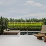 Ricefield View villa for sale in Ubud Centre featuring a tranquil modern interior, enclosed living and kitchen, warm natural tones, and access to premium wellness resort amenities.