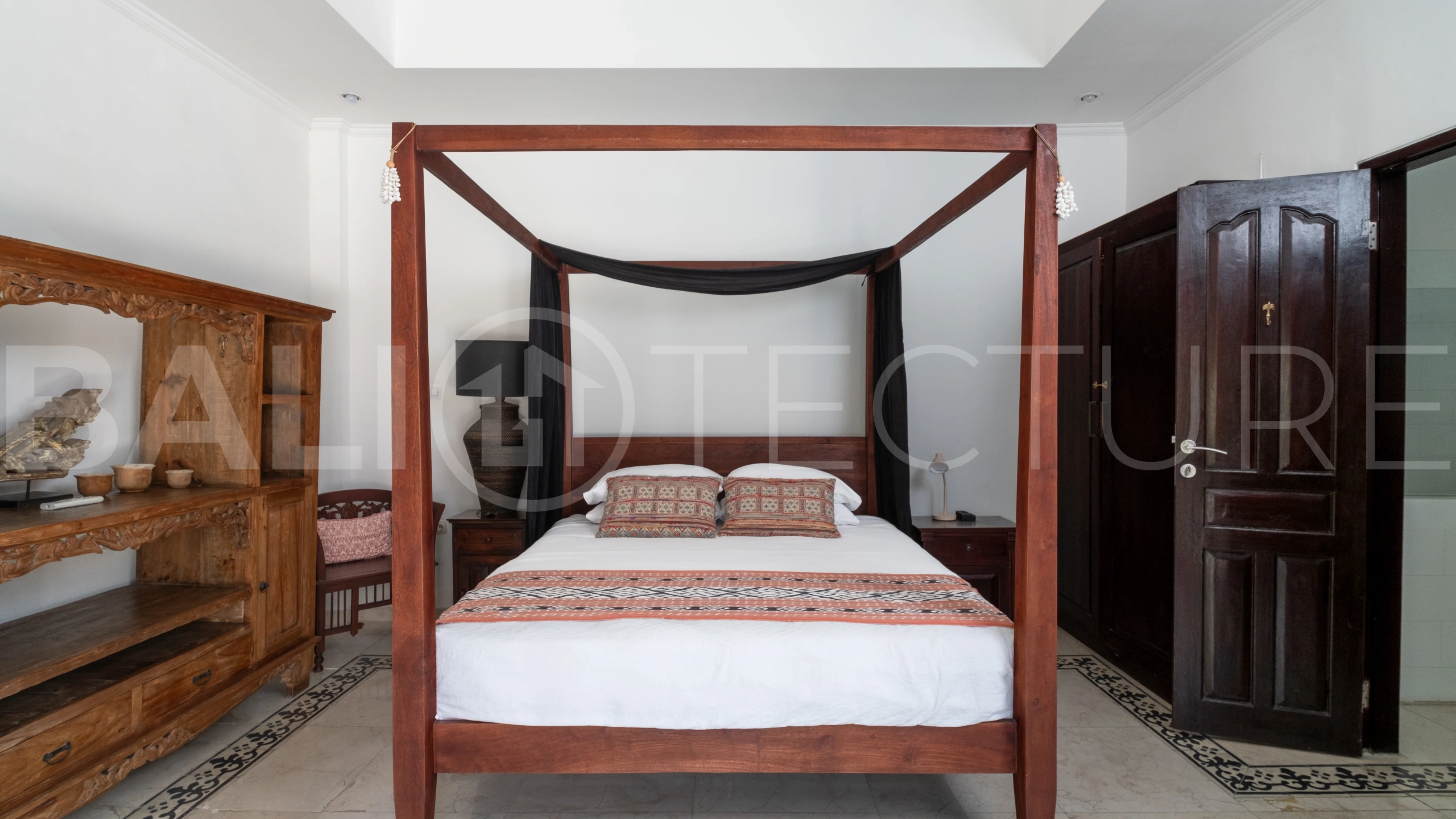 3-bedroom ricefield view villa for sale in Seminyak, featuring a private swimming pool, tropical garden, spacious living areas, and a peaceful residential setting.