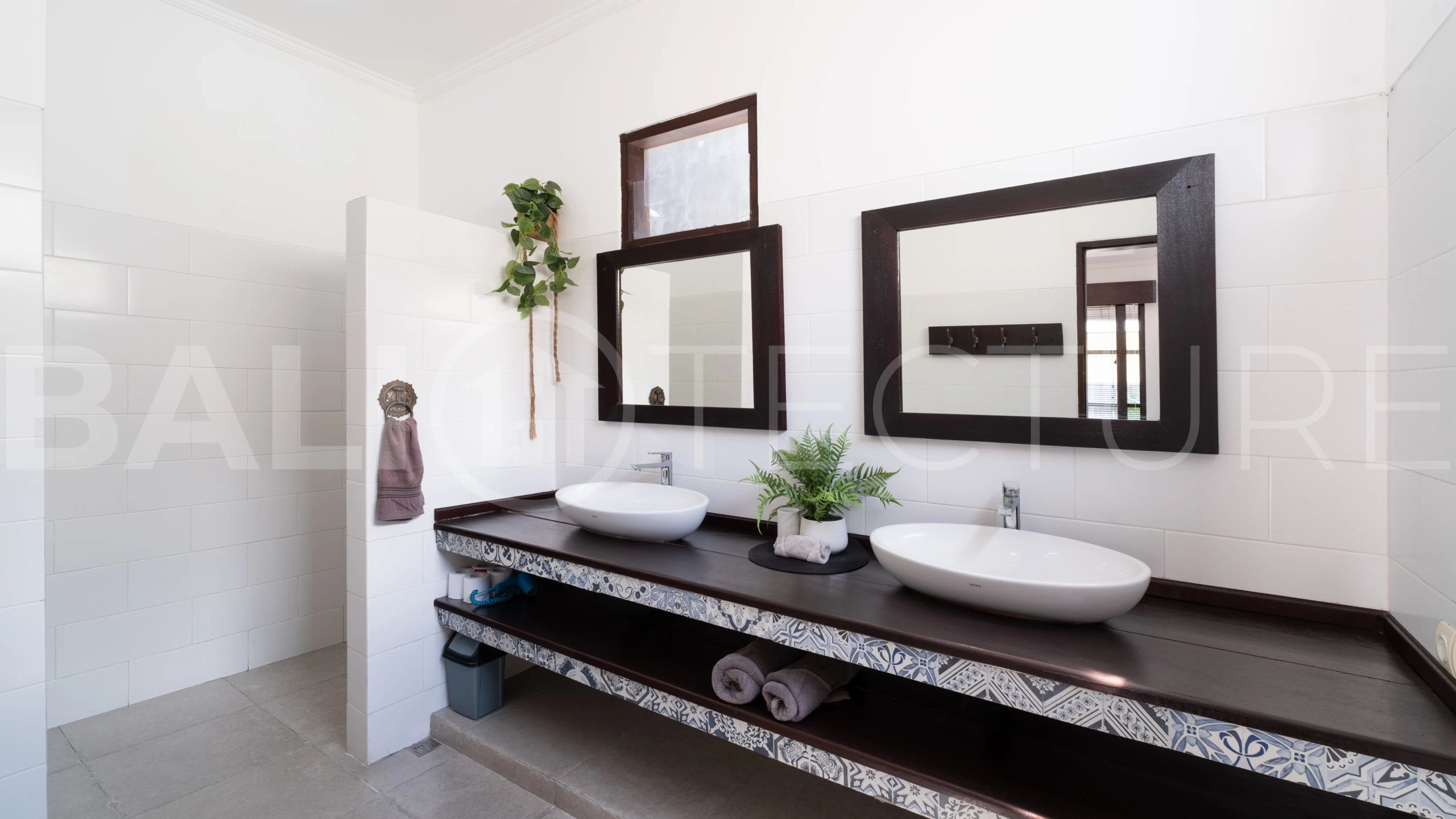 3-bedroom ricefield view villa for sale in Seminyak, featuring a private swimming pool, tropical garden, spacious living areas, and a peaceful residential setting.