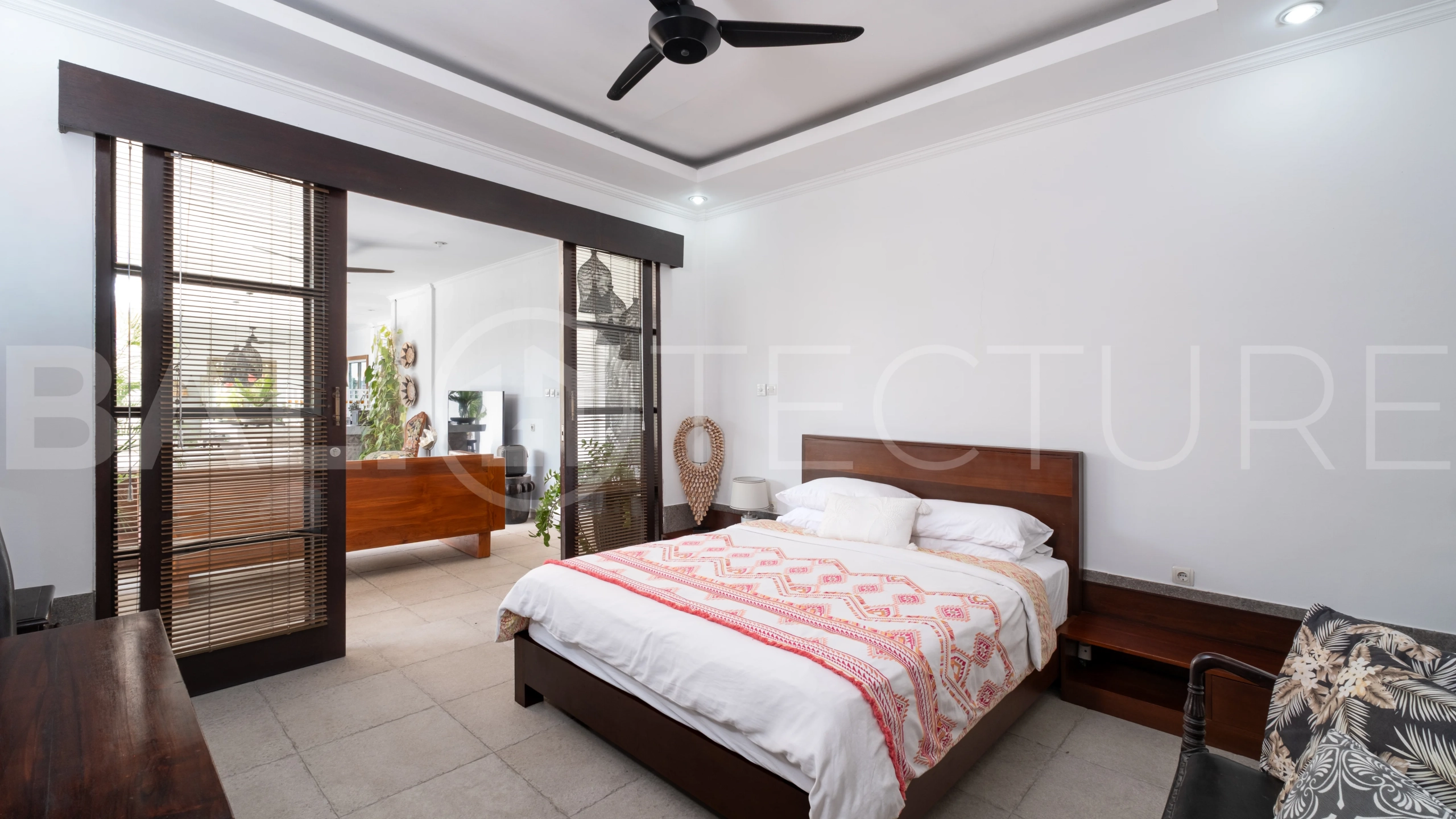 3-bedroom ricefield view villa for sale in Seminyak, featuring a private swimming pool, tropical garden, spacious living areas, and a peaceful residential setting.