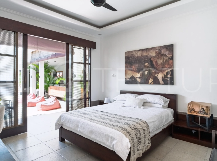 3-bedroom ricefield view villa for sale in Seminyak, featuring a private swimming pool, tropical garden, spacious living areas, and a peaceful residential setting.
