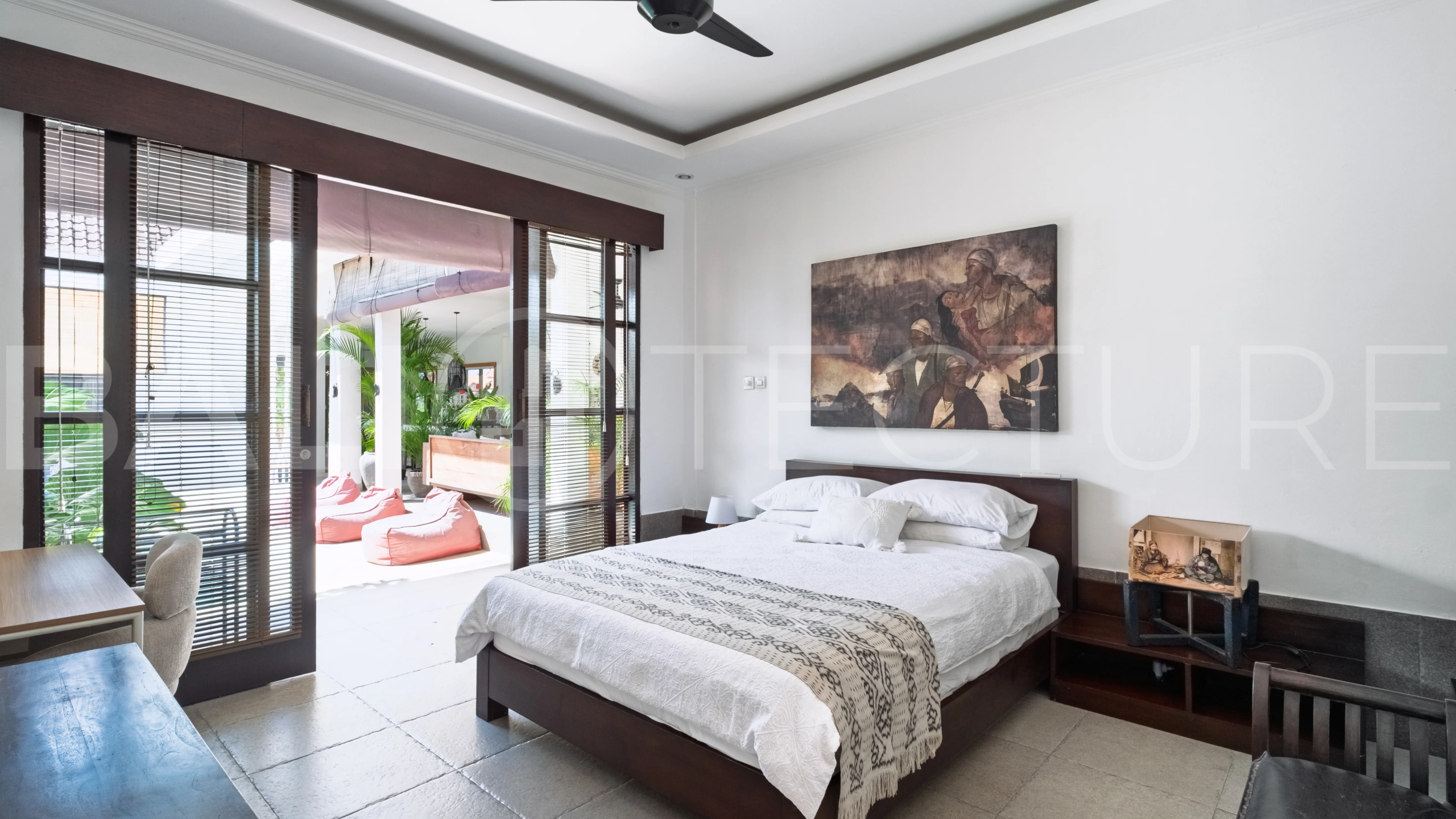 3-bedroom ricefield view villa for sale in Seminyak, featuring a private swimming pool, tropical garden, spacious living areas, and a peaceful residential setting.