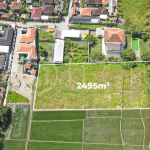2,495 m² yellow-zone leasehold land for sale in Nyambu, Kaba Kaba, with rectangular shape, car and motorbike access, and scenic rice field and mountain views.