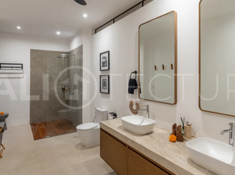 Brand-new 4-bedroom luxury leasehold villa for sale in tranquil Ubud, featuring a 100 sqm infinity pool overlooking lush canyon views, tropical modern architecture, spacious open-plan living areas, private parking, and unobstructed sunrise views.