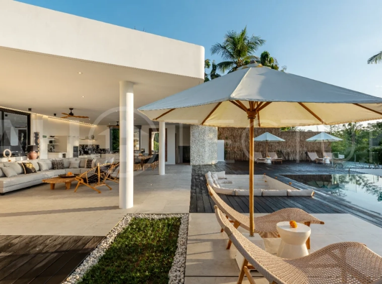 Brand-new 4-bedroom luxury leasehold villa for sale in tranquil Ubud, featuring a 100 sqm infinity pool overlooking lush canyon views, tropical modern architecture, spacious open-plan living areas, private parking, and unobstructed sunrise views.