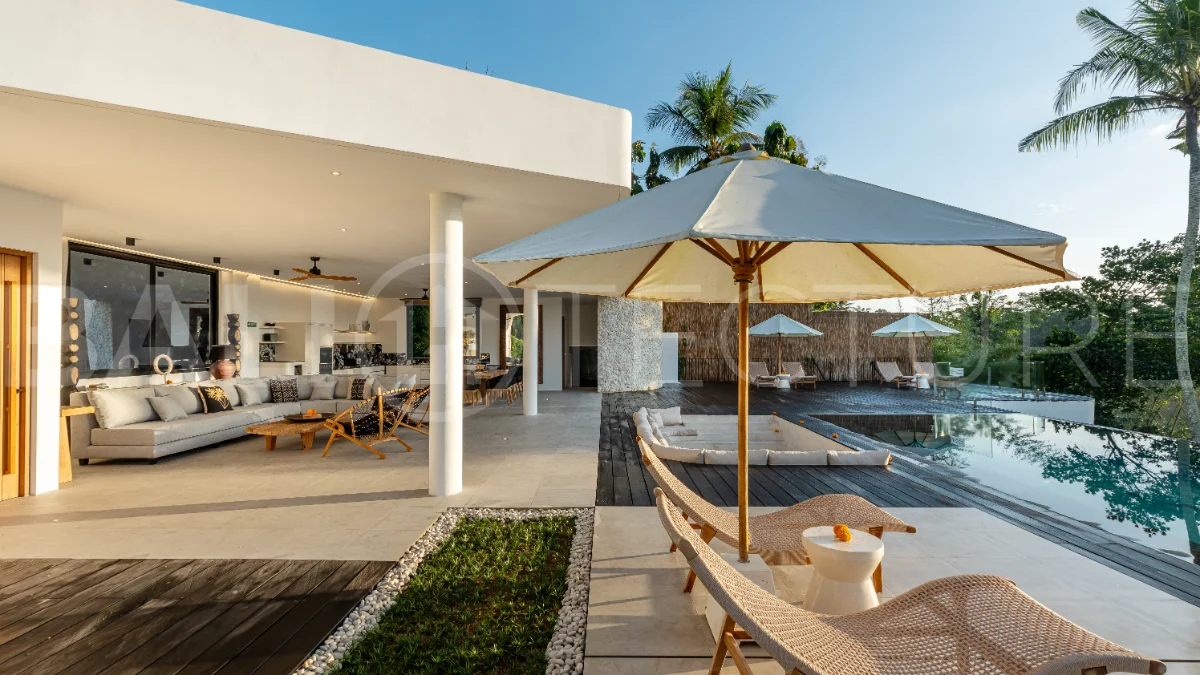 Brand-new 4-bedroom luxury leasehold villa for sale in tranquil Ubud, featuring a 100 sqm infinity pool overlooking lush canyon views, tropical modern architecture, spacious open-plan living areas, private parking, and unobstructed sunrise views.