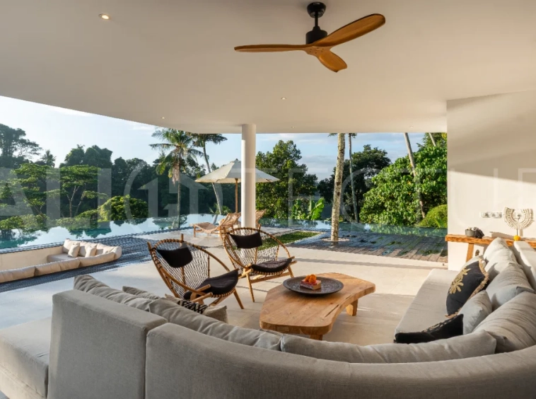 Brand-new 4-bedroom luxury leasehold villa for sale in tranquil Ubud, featuring a 100 sqm infinity pool overlooking lush canyon views, tropical modern architecture, spacious open-plan living areas, private parking, and unobstructed sunrise views.