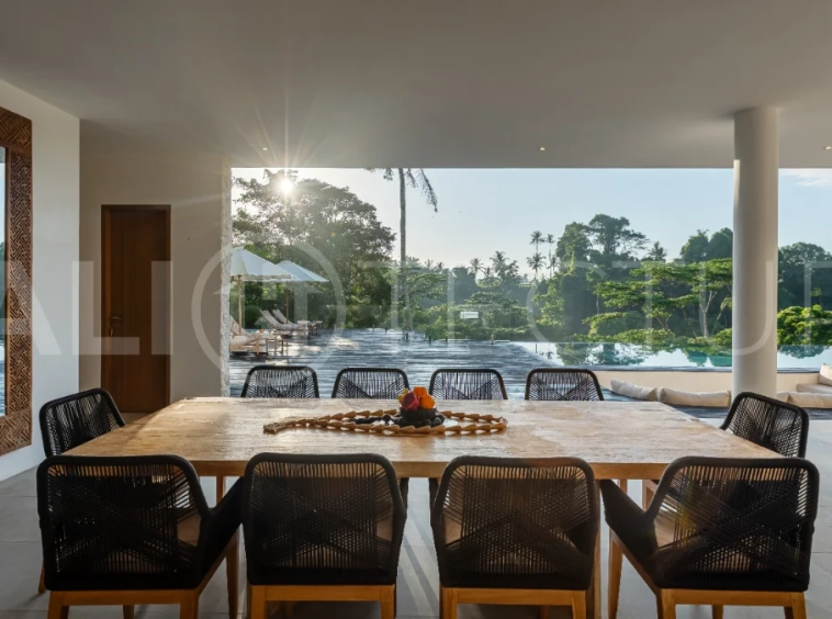 Brand-new 4-bedroom luxury leasehold villa for sale in tranquil Ubud, featuring a 100 sqm infinity pool overlooking lush canyon views, tropical modern architecture, spacious open-plan living areas, private parking, and unobstructed sunrise views.