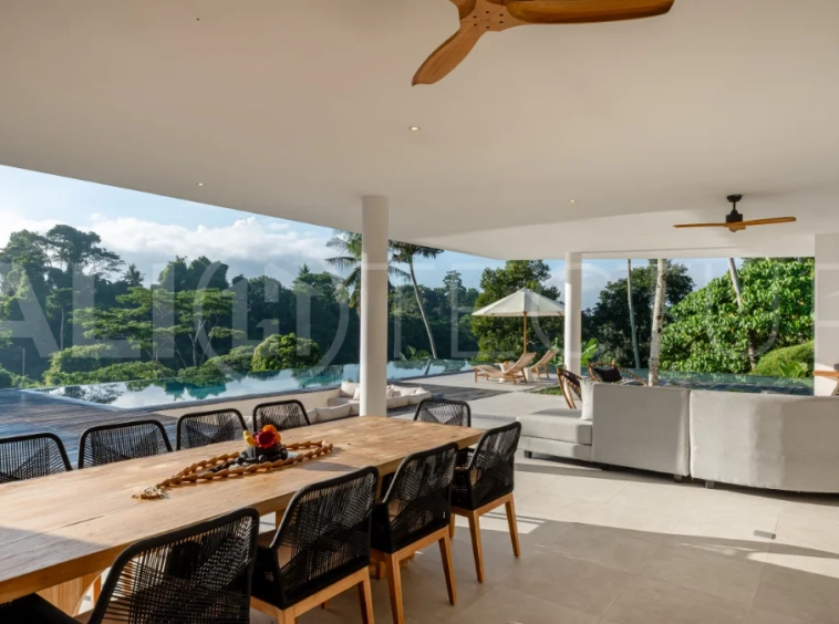 Brand-new 4-bedroom luxury leasehold villa for sale in tranquil Ubud, featuring a 100 sqm infinity pool overlooking lush canyon views, tropical modern architecture, spacious open-plan living areas, private parking, and unobstructed sunrise views.