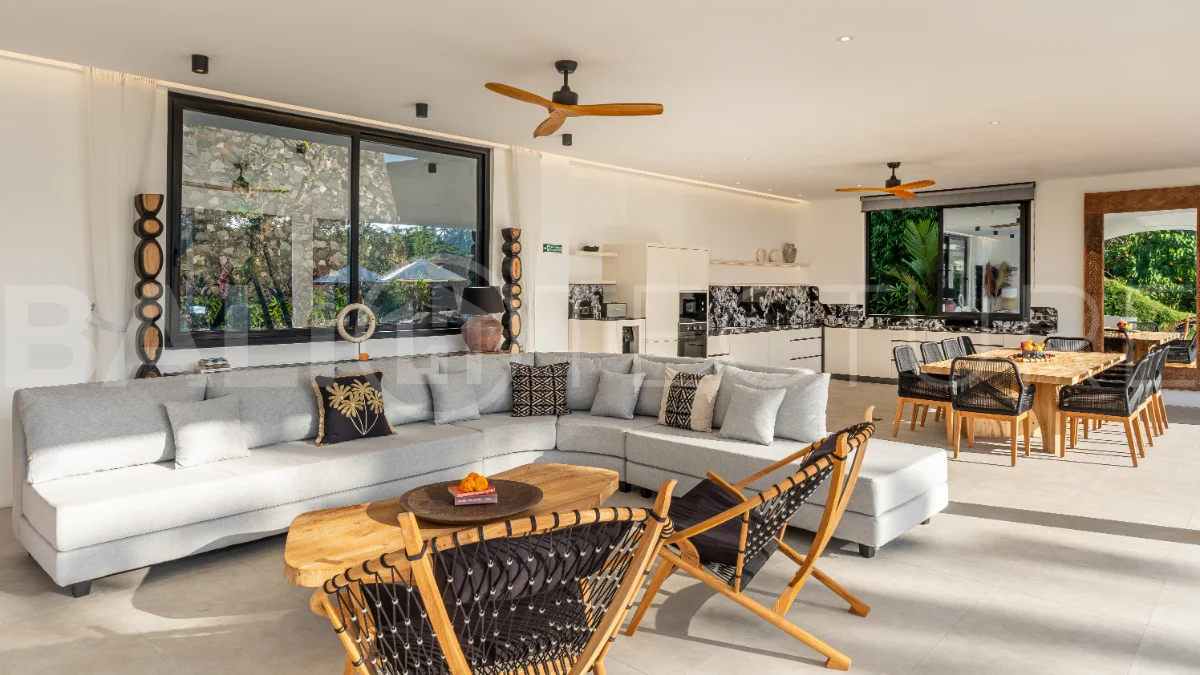 Brand-new 4-bedroom luxury leasehold villa for sale in tranquil Ubud, featuring a 100 sqm infinity pool overlooking lush canyon views, tropical modern architecture, spacious open-plan living areas, private parking, and unobstructed sunrise views.