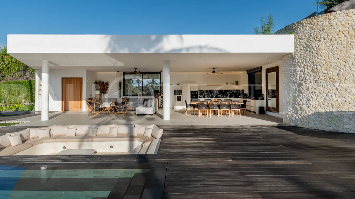 Brand-new 4-bedroom luxury leasehold villa for sale in tranquil Ubud, featuring a 100 sqm infinity pool overlooking lush canyon views, tropical modern architecture, spacious open-plan living areas, private parking, and unobstructed sunrise views.
