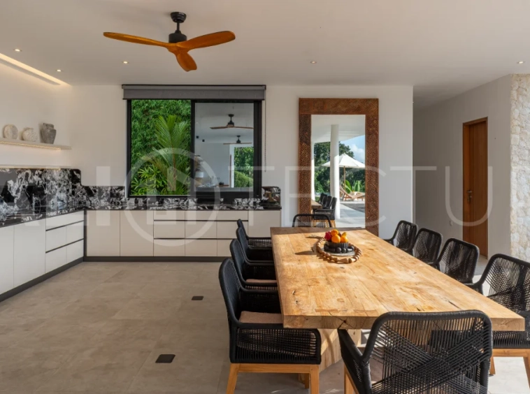 Brand-new 4-bedroom luxury leasehold villa for sale in tranquil Ubud, featuring a 100 sqm infinity pool overlooking lush canyon views, tropical modern architecture, spacious open-plan living areas, private parking, and unobstructed sunrise views.