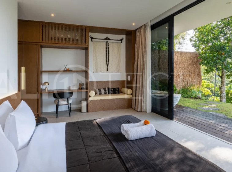 Brand-new 4-bedroom luxury leasehold villa for sale in tranquil Ubud, featuring a 100 sqm infinity pool overlooking lush canyon views, tropical modern architecture, spacious open-plan living areas, private parking, and unobstructed sunrise views.