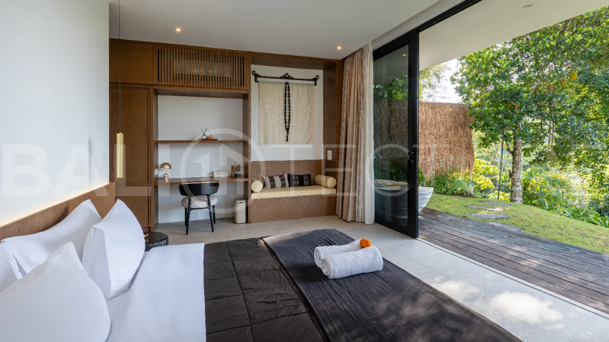 Brand-new 4-bedroom luxury leasehold villa for sale in tranquil Ubud, featuring a 100 sqm infinity pool overlooking lush canyon views, tropical modern architecture, spacious open-plan living areas, private parking, and unobstructed sunrise views.
