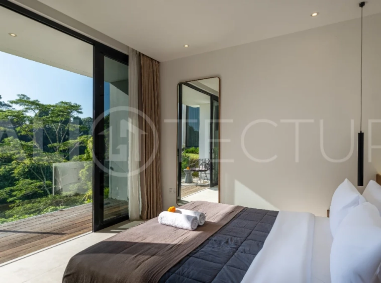 Brand-new 4-bedroom luxury leasehold villa for sale in tranquil Ubud, featuring a 100 sqm infinity pool overlooking lush canyon views, tropical modern architecture, spacious open-plan living areas, private parking, and unobstructed sunrise views.