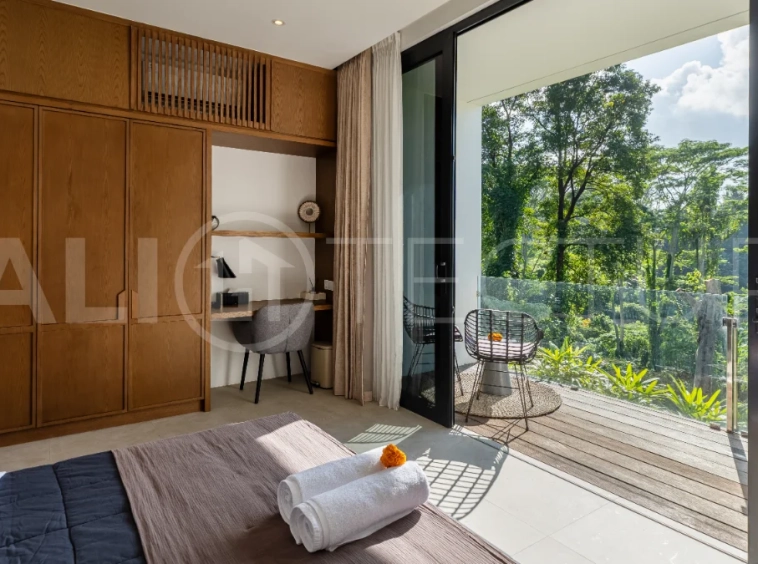 Brand-new 4-bedroom luxury leasehold villa for sale in tranquil Ubud, featuring a 100 sqm infinity pool overlooking lush canyon views, tropical modern architecture, spacious open-plan living areas, private parking, and unobstructed sunrise views.
