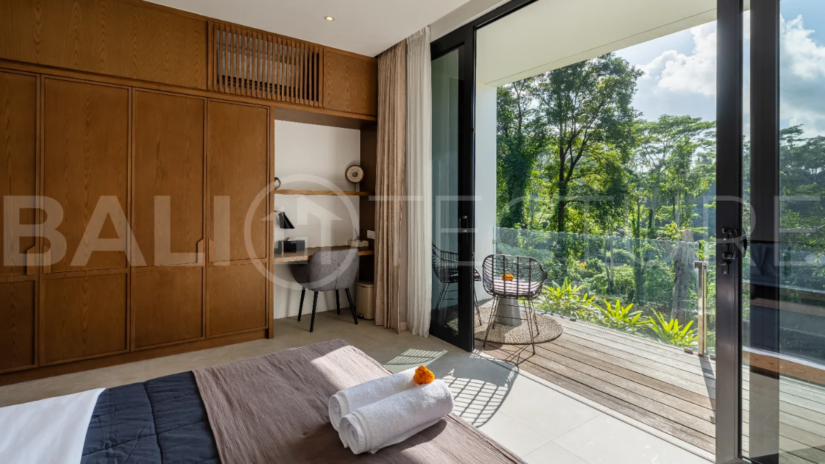 Brand-new 4-bedroom luxury leasehold villa for sale in tranquil Ubud, featuring a 100 sqm infinity pool overlooking lush canyon views, tropical modern architecture, spacious open-plan living areas, private parking, and unobstructed sunrise views.