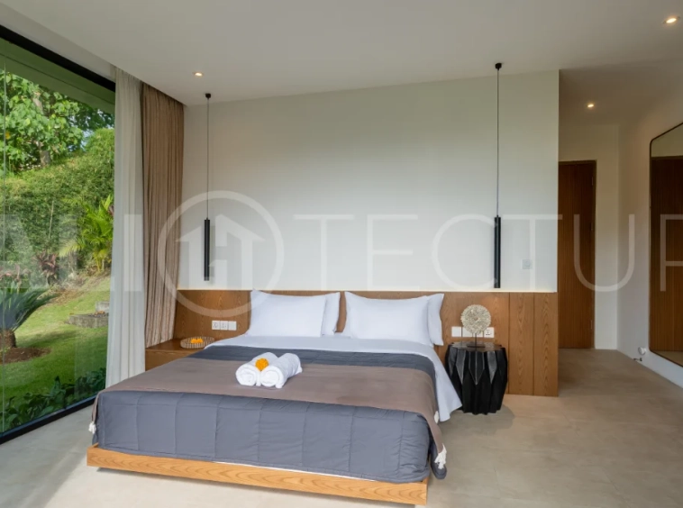 Brand-new 4-bedroom luxury leasehold villa for sale in tranquil Ubud, featuring a 100 sqm infinity pool overlooking lush canyon views, tropical modern architecture, spacious open-plan living areas, private parking, and unobstructed sunrise views.