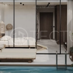 Studio villa for sale in Ubud Centre featuring tranquil natural interiors, warm wood accents, minimalist design, and access to a wellness-focused resort with yoga, sauna, ice plunge, restaurant, and concierge services.