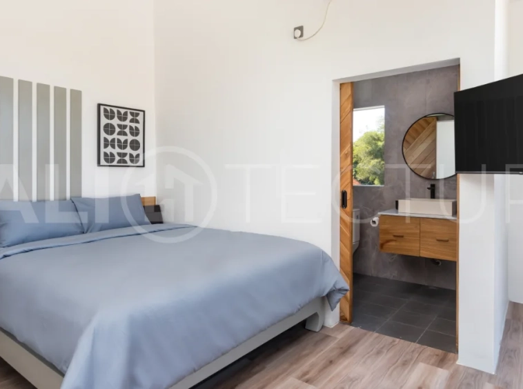 Umalas Bali villa enclave featuring four modern two-bedroom villas with private pools, tropical surroundings, and off-street parking.
