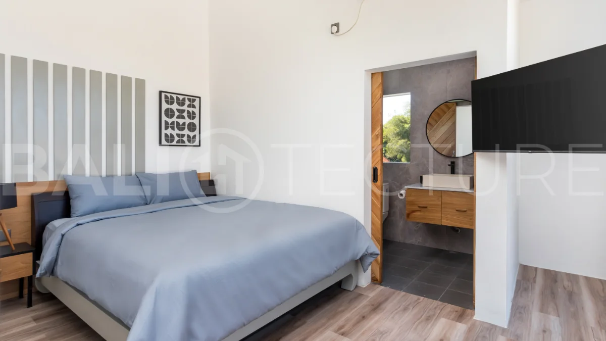 Umalas Bali villa enclave featuring four modern two-bedroom villas with private pools, tropical surroundings, and off-street parking.