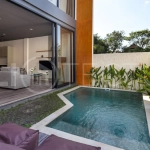 Umalas Bali villa enclave featuring four modern two-bedroom villas with private pools, tropical surroundings, and off-street parking.