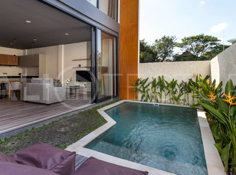 Umalas Bali villa enclave featuring four modern two-bedroom villas with private pools, tropical surroundings, and off-street parking.