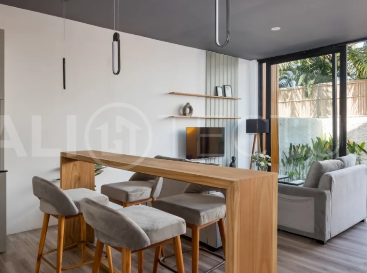 Umalas Bali villa enclave featuring four modern two-bedroom villas with private pools, tropical surroundings, and off-street parking.
