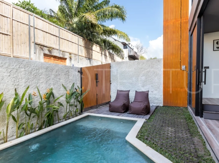 Umalas Bali villa enclave featuring four modern two-bedroom villas with private pools, tropical surroundings, and off-street parking.
