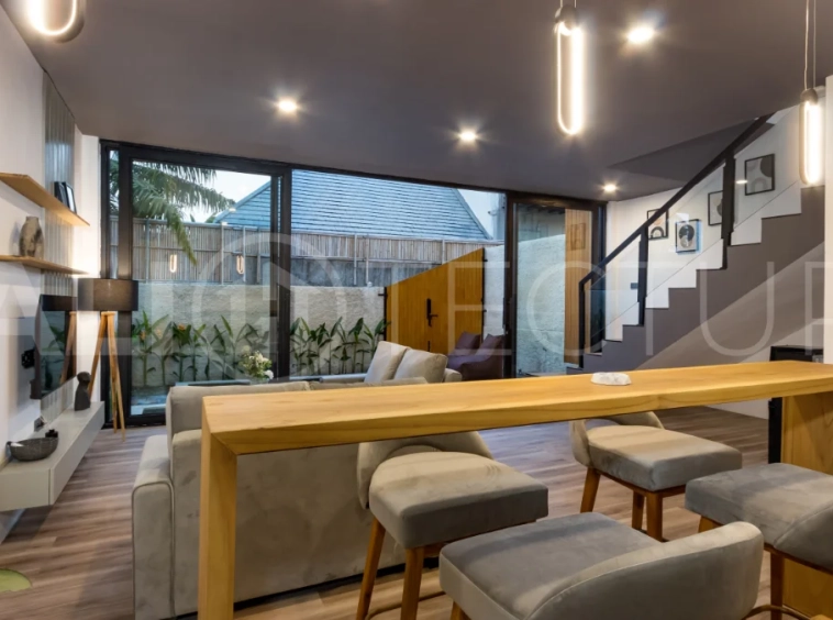 Umalas Bali villa enclave featuring four modern two-bedroom villas with private pools, tropical surroundings, and off-street parking.