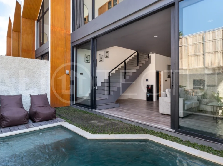Umalas Bali villa enclave featuring four modern two-bedroom villas with private pools, tropical surroundings, and off-street parking.