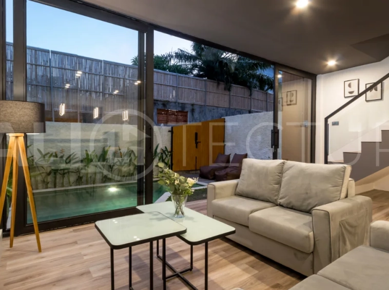 Umalas Bali villa enclave featuring four modern two-bedroom villas with private pools, tropical surroundings, and off-street parking.