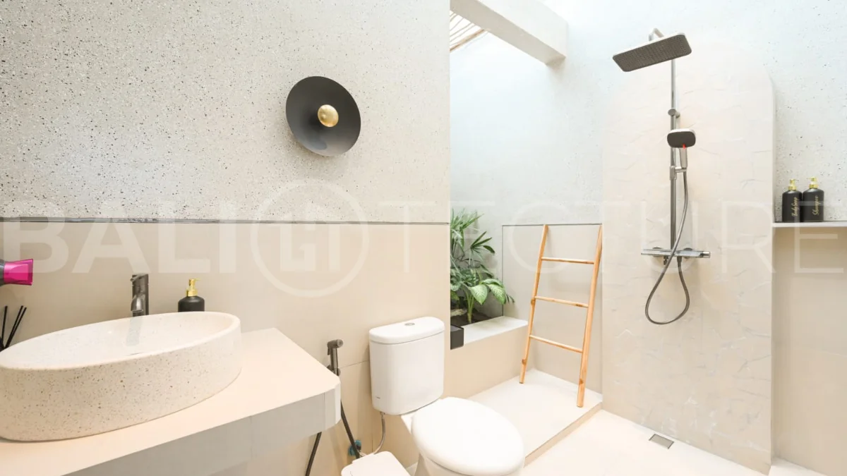 Brand-new 2-bedroom villa for sale in Pecatu, Uluwatu, featuring a modern two-storey design, 55 m² of land, 70 m² of building space, and a private jacuzzi, close to beaches, restaurants, cafés, gyms, golf, and renowned beach clubs.